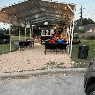 Outside eating area and food truck location.