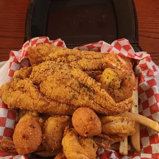 Seafood plate fish, shrimp, hush puppies &amp; seasoned fries