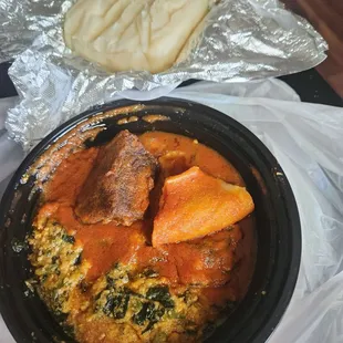Egusi, beef tripe, beef, and pounded yam