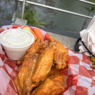 a basket of chicken wings