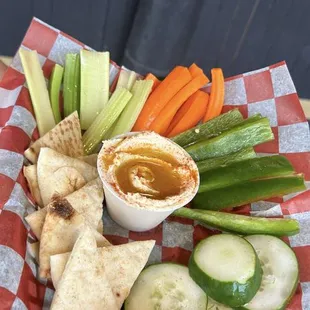 Hummus Plate! 
Hummus drizzled with olive oil and paprika served with warm pita bread and mixed vegetables!