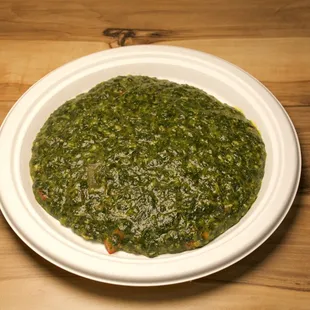 Mulukhayah is a traditional Middle Eastern dish, especially popular in Egypt. It features a hearty green leafy vegetable called jute mallow,