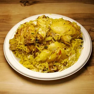 Yemeni Zurbian, a taste of Yemen's rich heritage. Fragrant basmati rice and slow-cooked meat, infused with an aromatic blend of spices