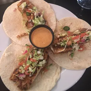 three tacos on a plate