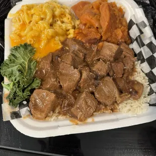 Beef stew, rice, mac &amp;cheese and sweet potatoes.