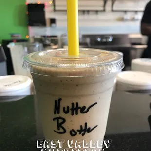 a smoothie in a plastic cup