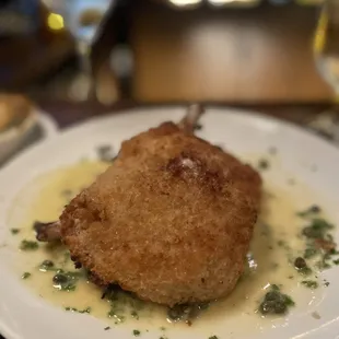 Panko crusted pork chops in a beurre blanc sauce