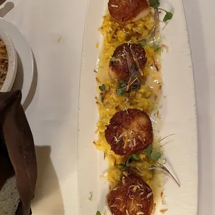 Diver scallops with coconut risotto