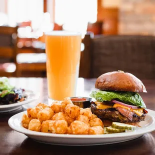 a burger and tater tots