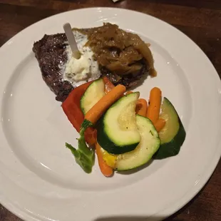 My serlion steak with caramelized onions and vegetables.