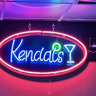 a neon sign in a restaurant