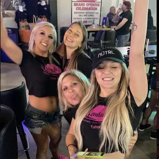 a group of women posing for a picture