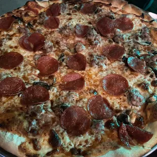 Pepperoni, sausage, &amp; mushroom pizza
