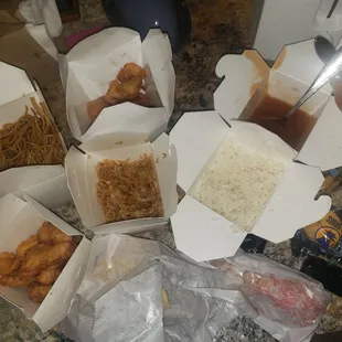 Beef Lomein, orange chicken, sweet and sour chicken, fried and white rice, cream cheese wontons, and egg rolls.
