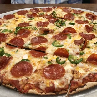 Pepperoni and onion with fresh jalapeños