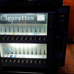 Remember these machines? It only takes cash, so bring lots of singles and quarters for you $9 pack of cigarettes.