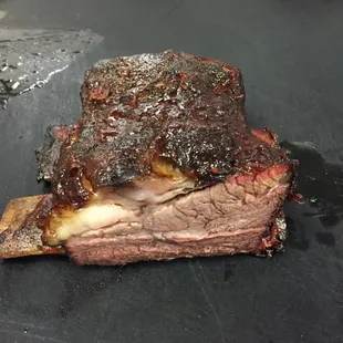 a piece of meat on a grill