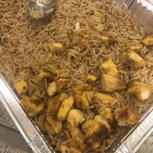 I moved the chicken to one side to show the rice to chicken portion. This is not 2LB CHICKEN OVER RICE