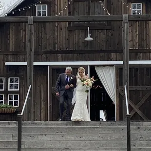 Here comes the bride, the wedding was outside