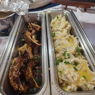 two serving trays of food