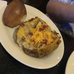 Loaded baked potato and dinner roll