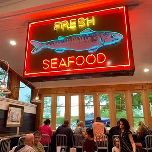 a neon sign in a restaurant