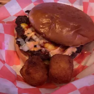 Smash burger and a couple cowboy bites (cream cheese, corn, jalapeño, bacon)