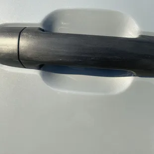Damaged door handle that wasn't replaced.