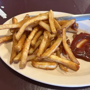 Top tier french fries (labeled spicy- not very hot).