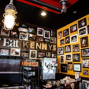 a wall full of pictures