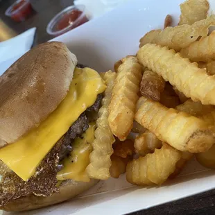 Double cheeseburger with an egg w/ fries