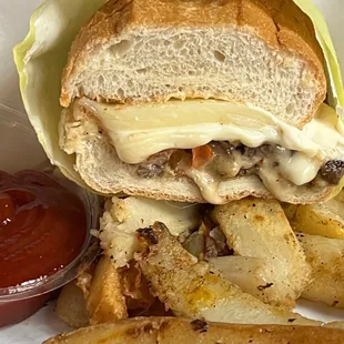 Cheesesteak and Kenny&apos;s special potatoes.