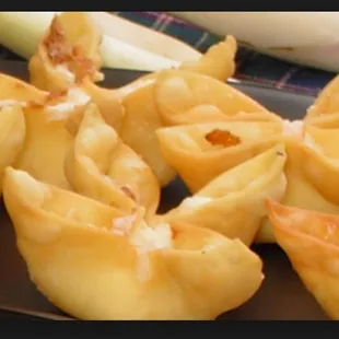 These crab rangoon ate delicious, they have cheese inside and comes with sweet sour sauce.