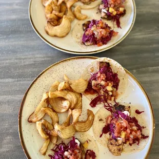 Fish and Shrimp Taco&apos;s, both blackened with homemade curly fries