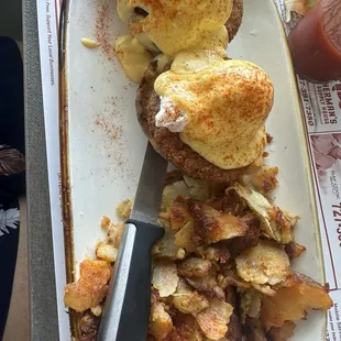 Crab cake Benedict with home fries. Great home cooked tasting food.