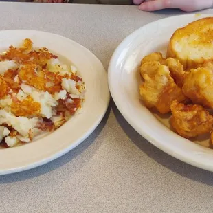 Side of hash brown and fried fish with cranberry tartar sauce. The tartar sauce is AWESOME.
