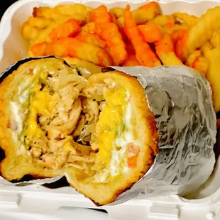 a chicken burrito and french fries