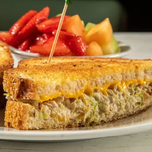 Keno's Tuna Melt: all white Albacore tuna salad topped with melted American cheese on grilled rye bread.