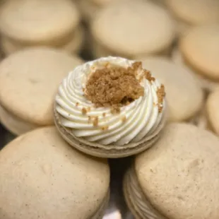 a close up of a cookie with a bite taken out of it