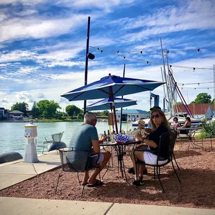 Outdoor seating along the water