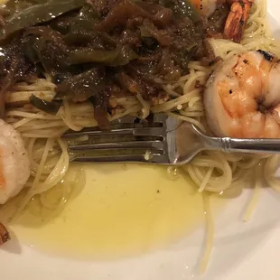 a plate of shrimp and pasta