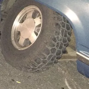 This is after he dragged the truck notice how the tire is slanted now and marks on the road