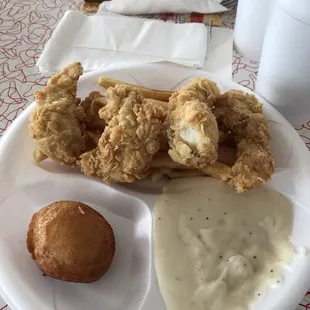 The 4 piece chicken plate with fries, white gravy and a puff. $5.99+tax.