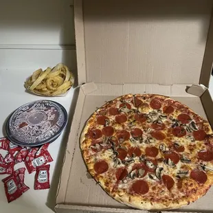 Pizza, meatballs and onion rings.