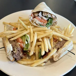 a plate of fries and a sandwich