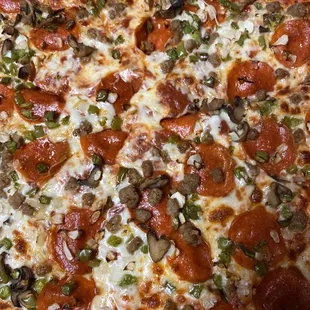 a pepperoni and mushroom pizza