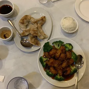 Pan fried dumplings, meat broccoli dish