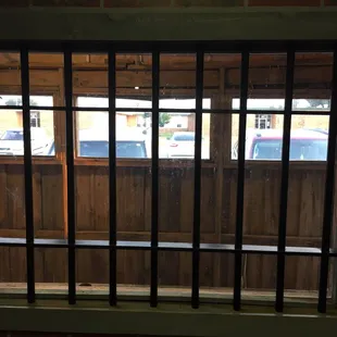 Bars on the windows to look like a jailhouse I think