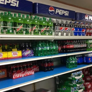 a variety of sodas and soft drinks
