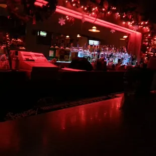 a bar with red lights